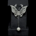 ⁦رانيا بروش أبيض زركون مطلي بالروديوم عالي الجودة⁩ - الصورة ⁦4⁩